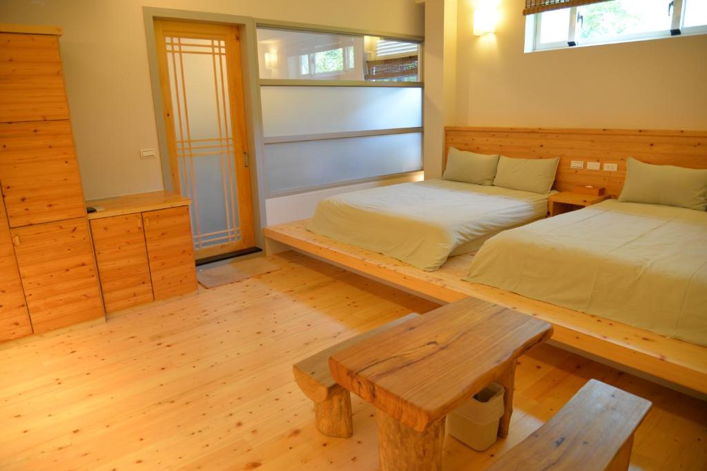 Postel nebo postele na pokoji v ubytování Taiori House
