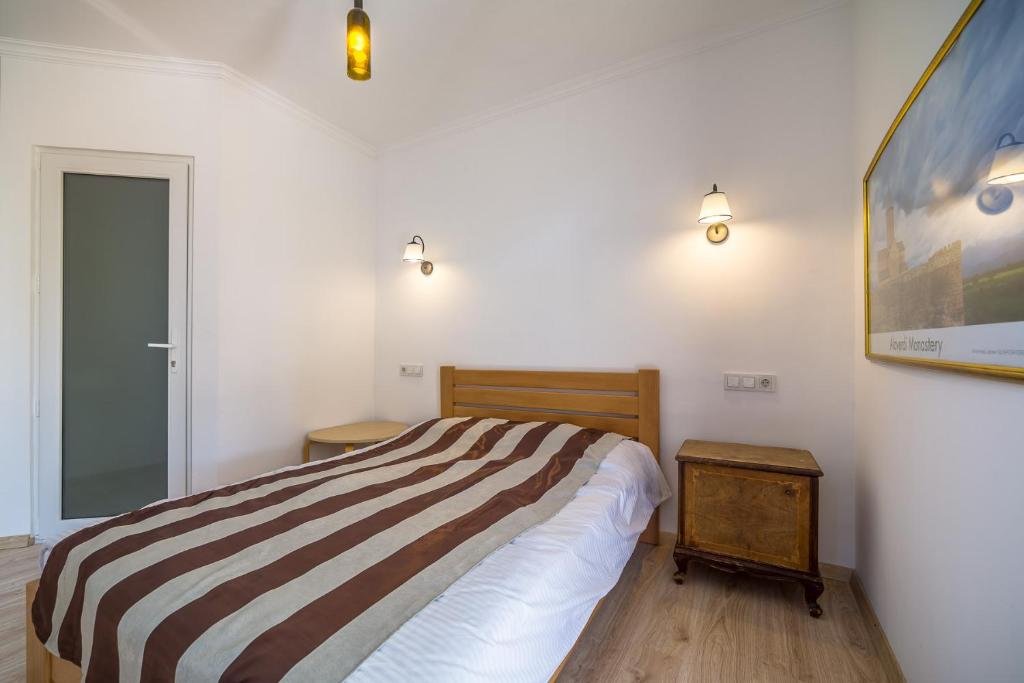 Postel nebo postele na pokoji v ubytování Chateau Napareuli