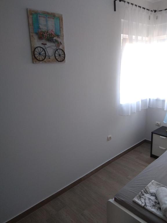 Postel nebo postele na pokoji v ubytování Apartment Domagoj, Novalja