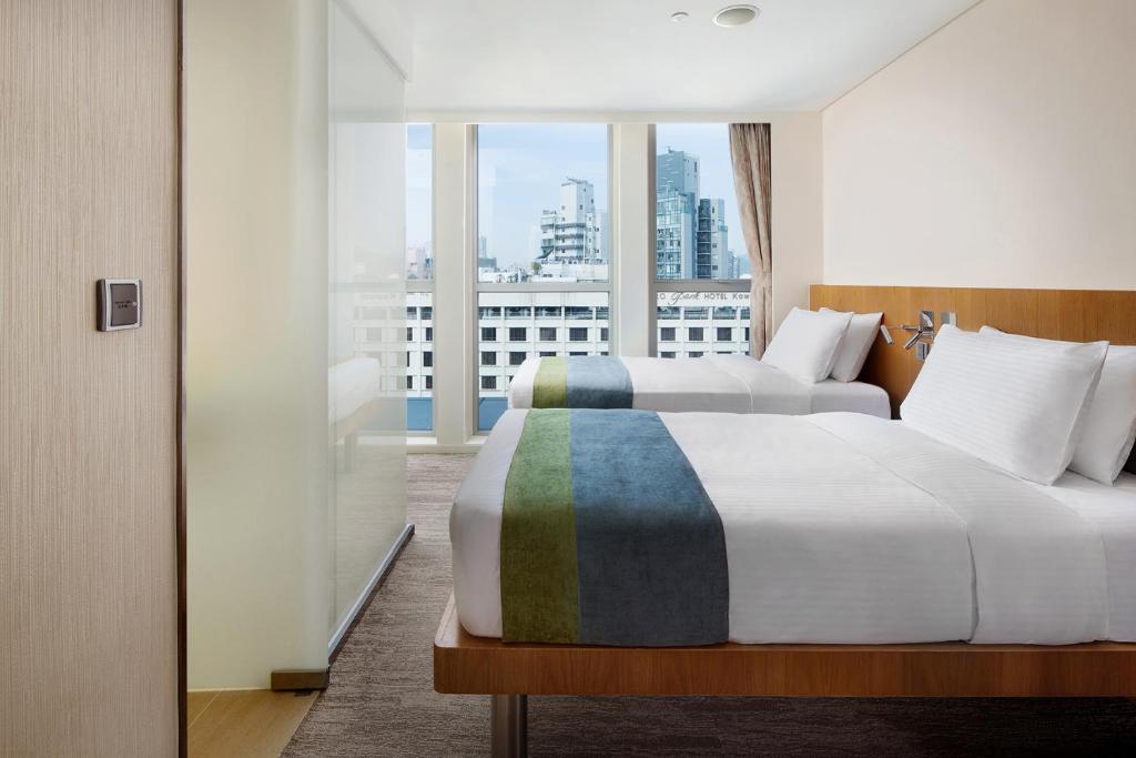 Katil atau katil-katil dalam bilik di Summit View Kowloon