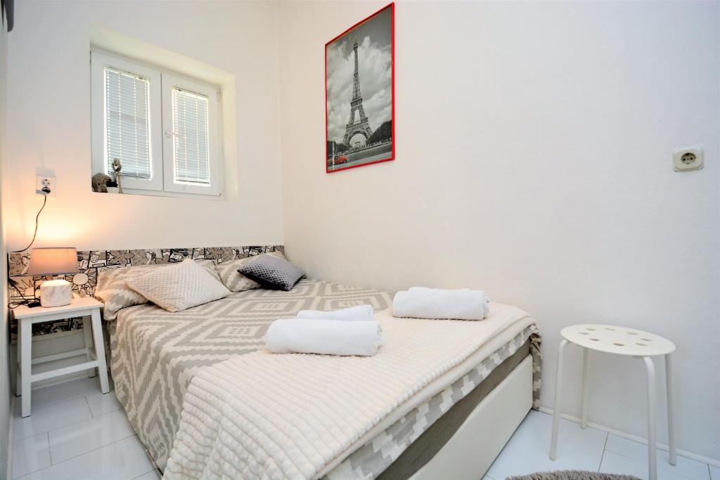 Posteľ alebo postele v izbe v ubytovaní Apartment Populare