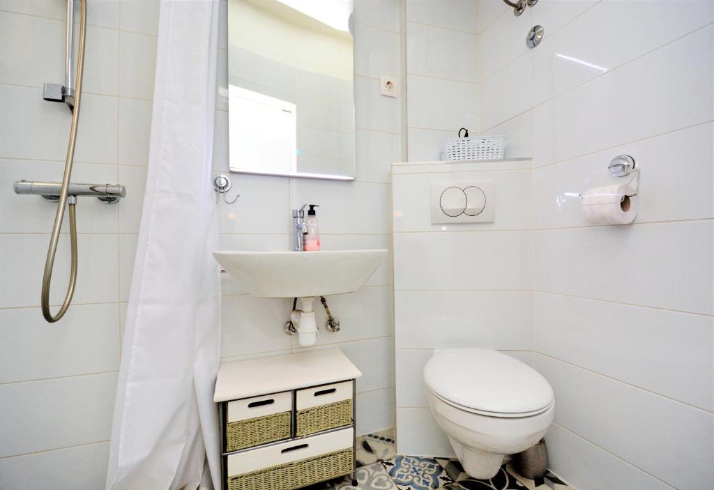 Kúpeľňa v ubytovaní Apartment Populare
