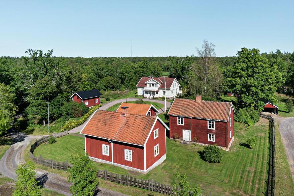 an aerial view of a large house on a field at Högetorp in Oskarshamn