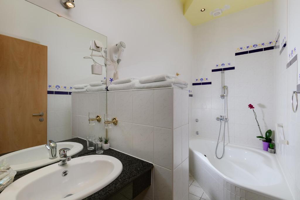 Koupelna v ubytování Hotel Scaletta