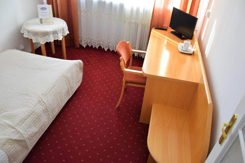 Televízia a/alebo spoločenská miestnosť v ubytovaní Centrum Konferencyjne IBIB PAN