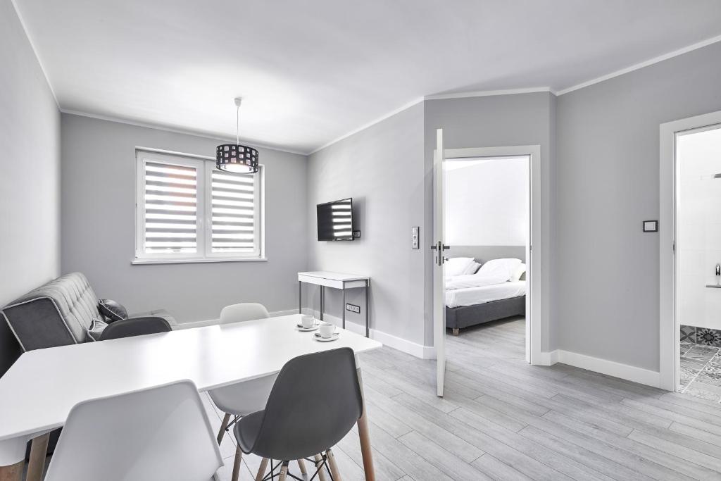Posteľ alebo postele v izbe v ubytovaní Apartamenty Między Jeziorami - Free Parking, FV