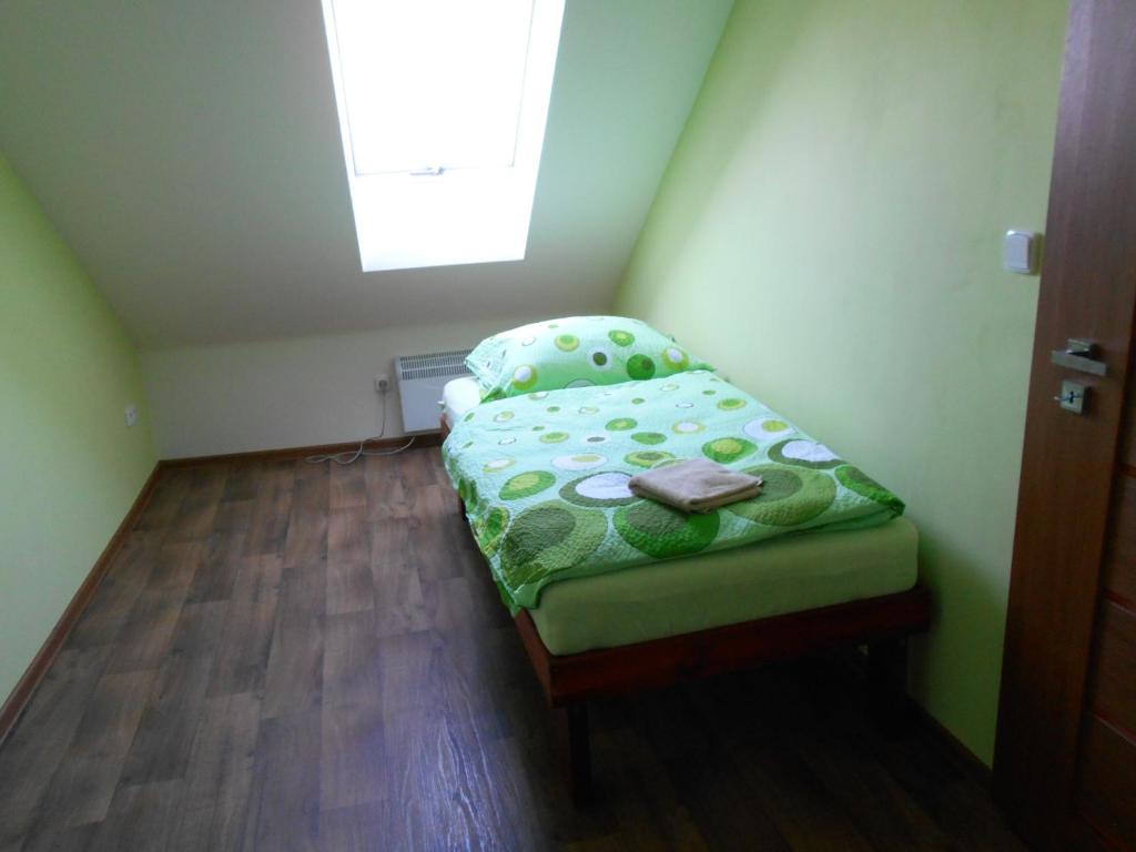 Postel nebo postele na pokoji v ubytování Penzion Imrichovi