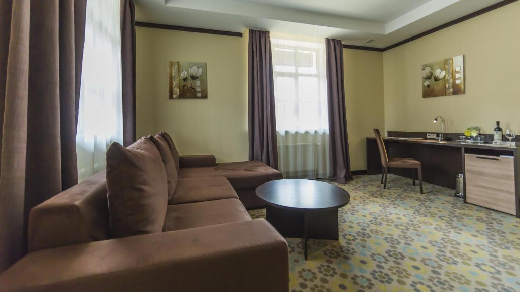 Posezení v ubytování Park-Hotel Golosievo