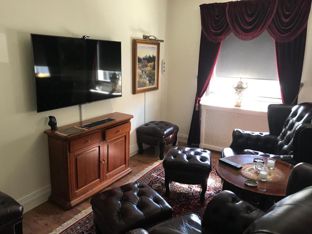TV a/nebo společenská místnost v ubytování BoSmart Apartments