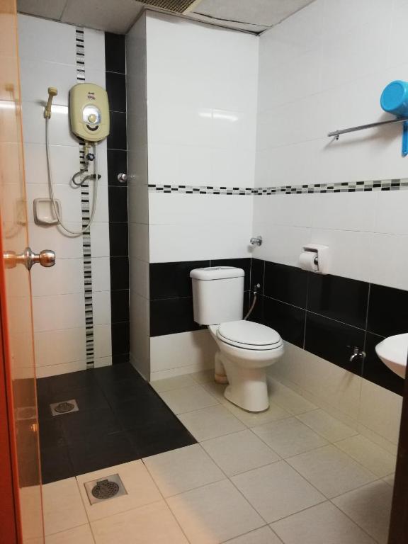 Koupelna v ubytování Hotel Damai