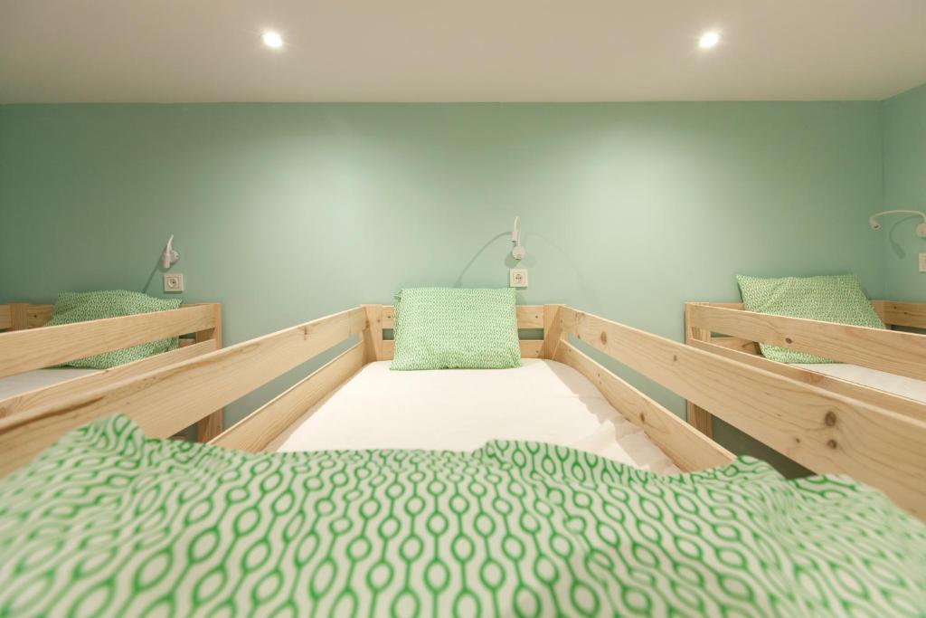 Postel nebo postele na pokoji v ubytování Balea Hostel