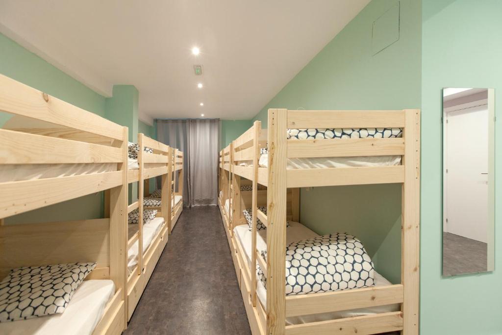 Postel nebo postele na pokoji v ubytování Balea Hostel