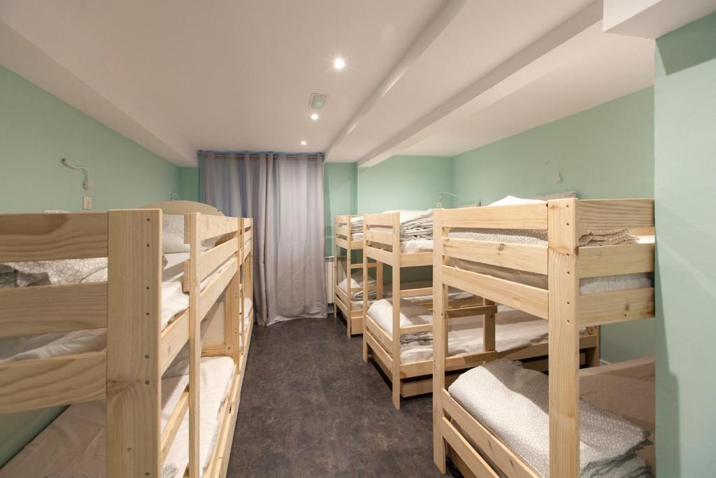 Postel nebo postele na pokoji v ubytování Balea Hostel