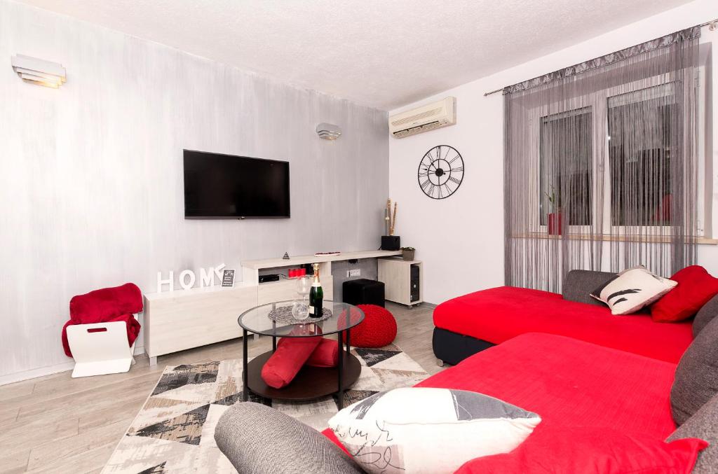 TV a/nebo společenská místnost v ubytování Guesthause Antonio