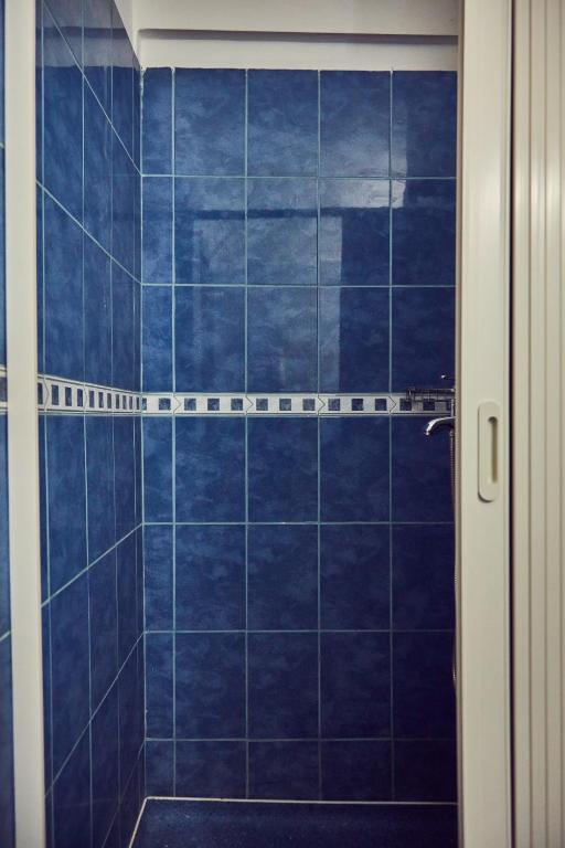 Koupelna v ubytování Hotel Olimpic