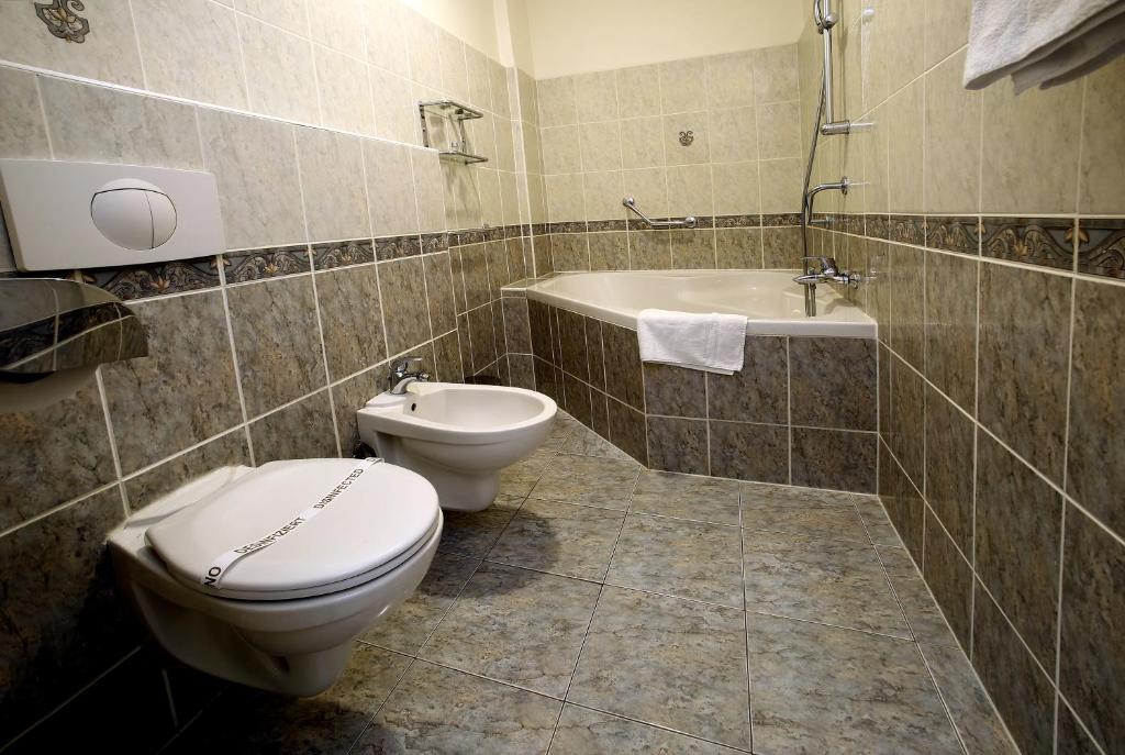 Koupelna v ubytování Hotel Central