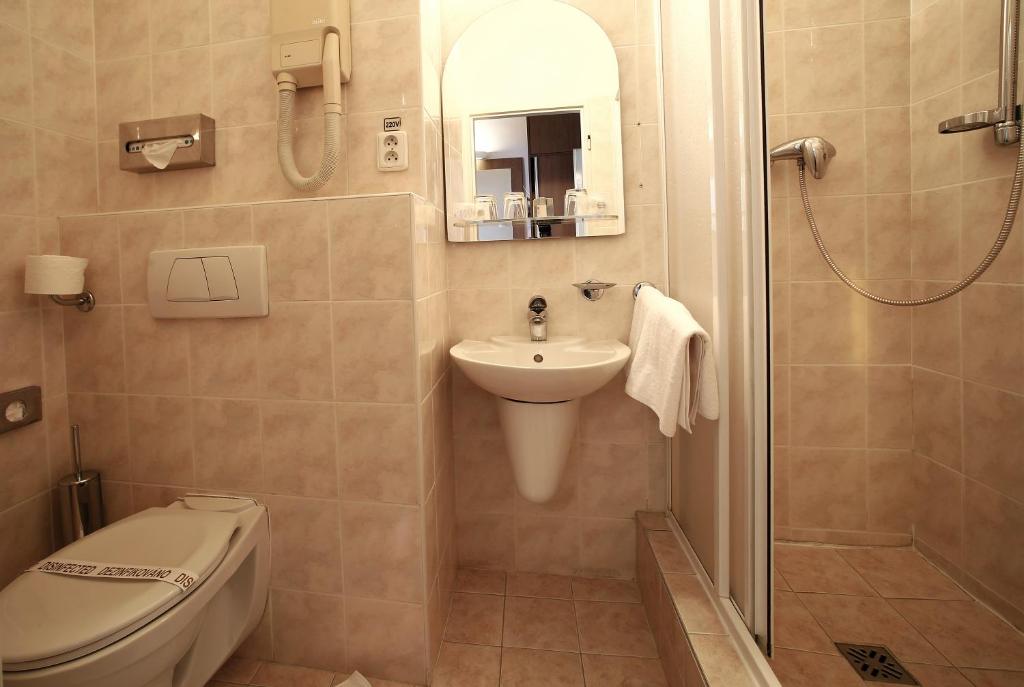 Koupelna v ubytování Hotel Central