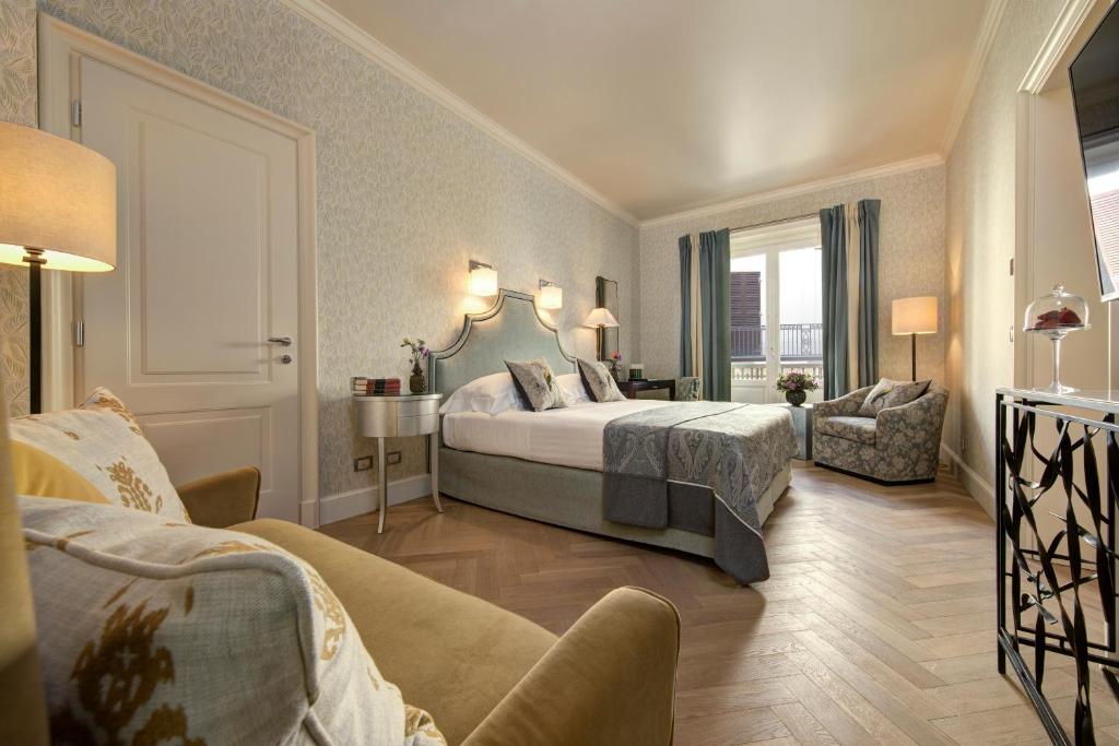 Postel nebo postele na pokoji v ubytování Rocco Forte Hotel Savoy