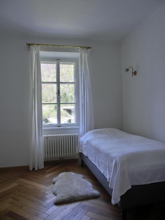 A bed or beds in a room at Villa Bertholini