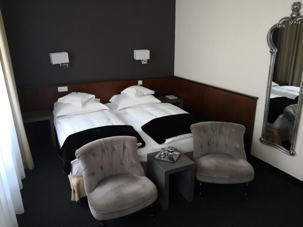 Postel nebo postele na pokoji v ubytování Hotel Lindenhof