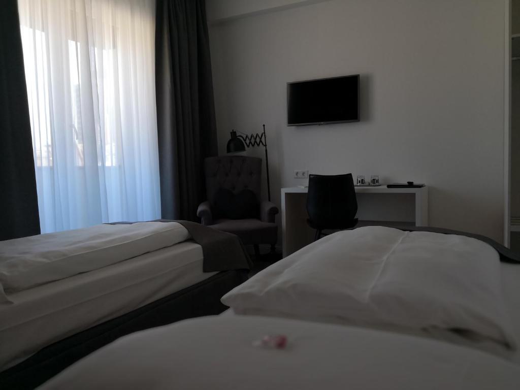 Postel nebo postele na pokoji v ubytování Hotel Lindenhof