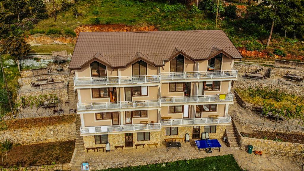 an aerial view of a large house with a roof at Villa Megdani B in Ohrid