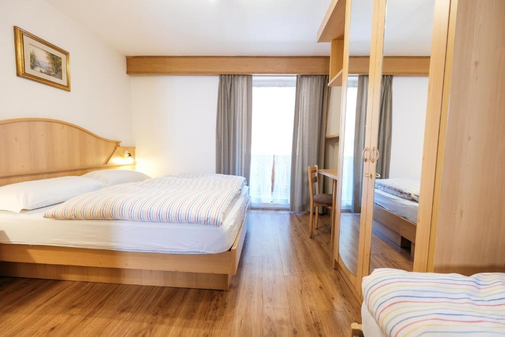 Postel nebo postele na pokoji v ubytování Appartamenti Bel Sit
