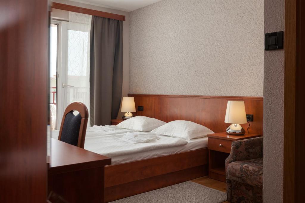 Postel nebo postele na pokoji v ubytování Villa Vinka