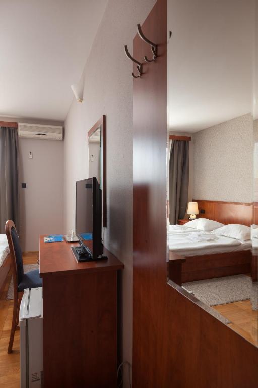 Postel nebo postele na pokoji v ubytování Villa Vinka