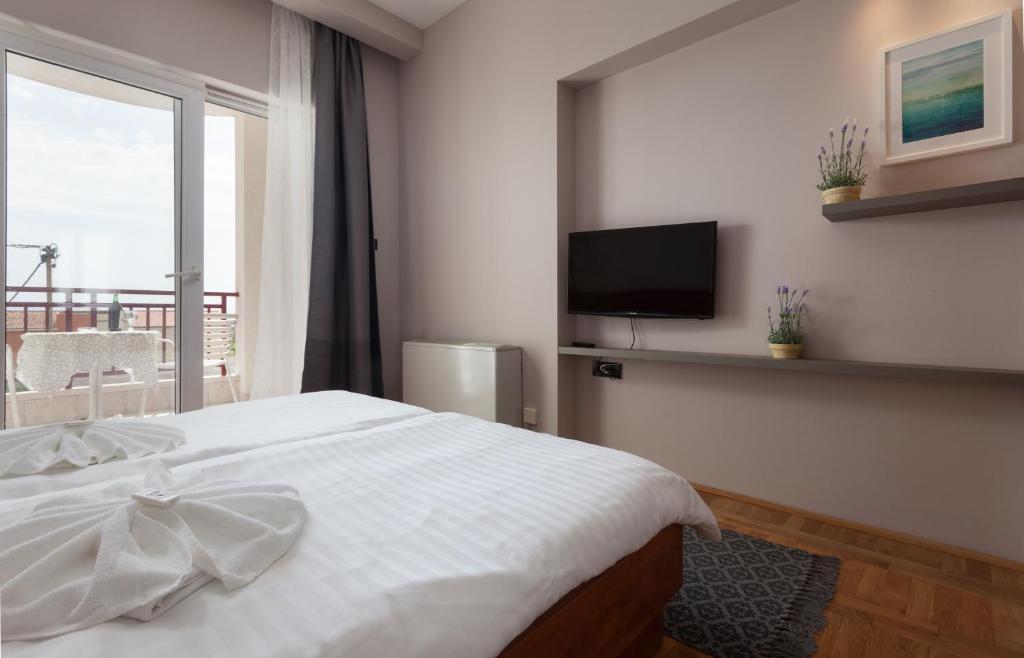 Postel nebo postele na pokoji v ubytování Villa Vinka