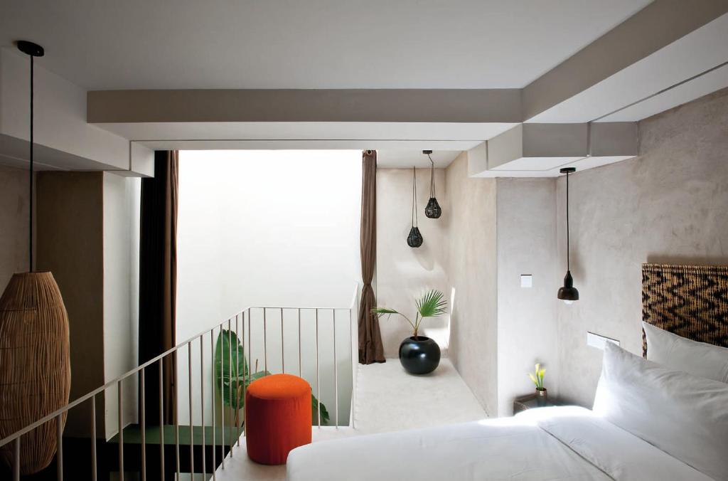 Una cama o camas en una habitación de Numa Marrakech