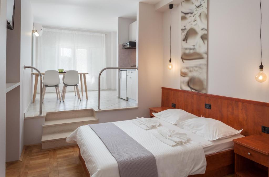 Postel nebo postele na pokoji v ubytování Villa Vinka