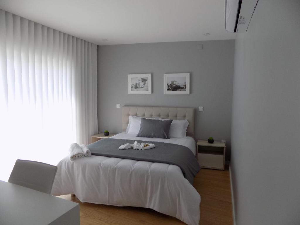 Postel nebo postele na pokoji v ubytování CMB Guesthouse