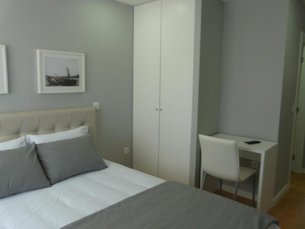 Postel nebo postele na pokoji v ubytování CMB Guesthouse