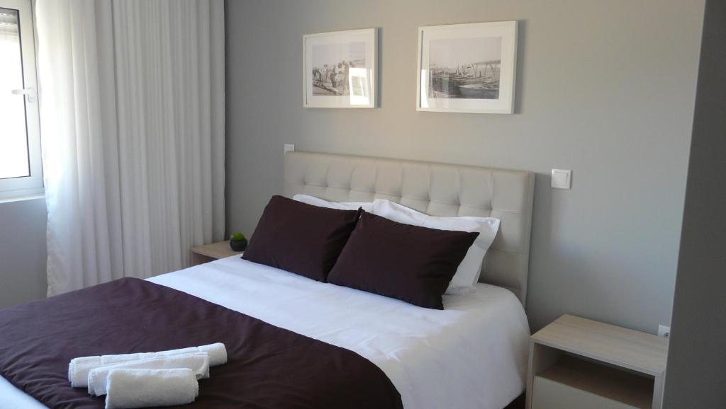 Postel nebo postele na pokoji v ubytování CMB Guesthouse