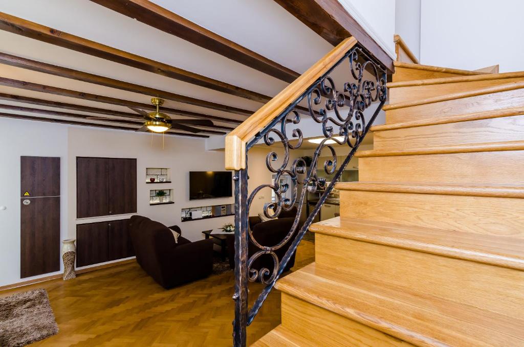 Televízia a/alebo spoločenská miestnosť v ubytovaní Apartment Maru Prestige
