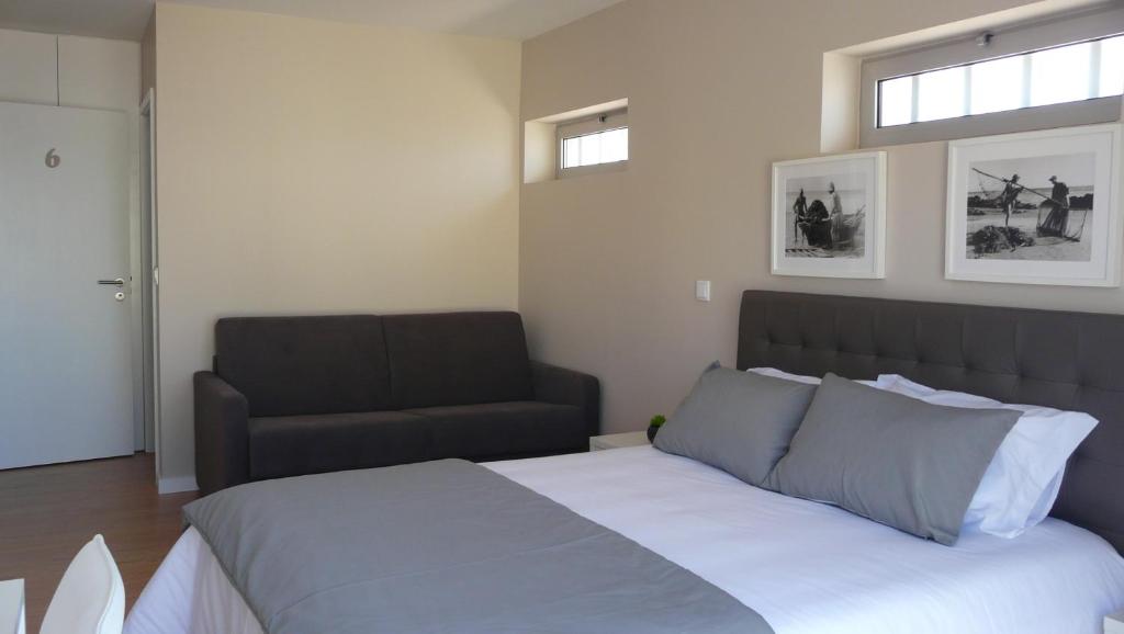 Postel nebo postele na pokoji v ubytování CMB Guesthouse