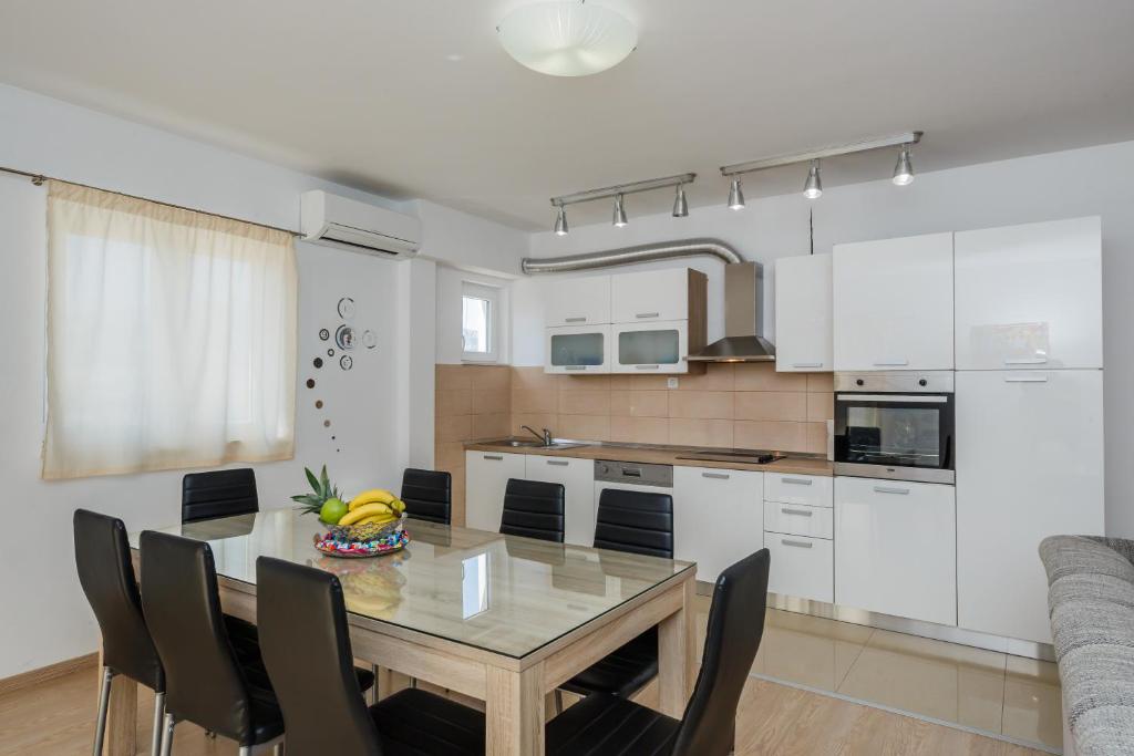 Kuchyňa alebo kuchynka v ubytovaní Apartments Selak