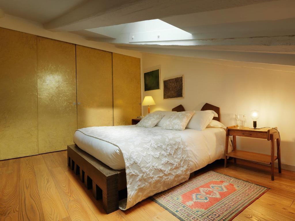 Postel nebo postele na pokoji v ubytování Boutique Hotel Albero Nascosto