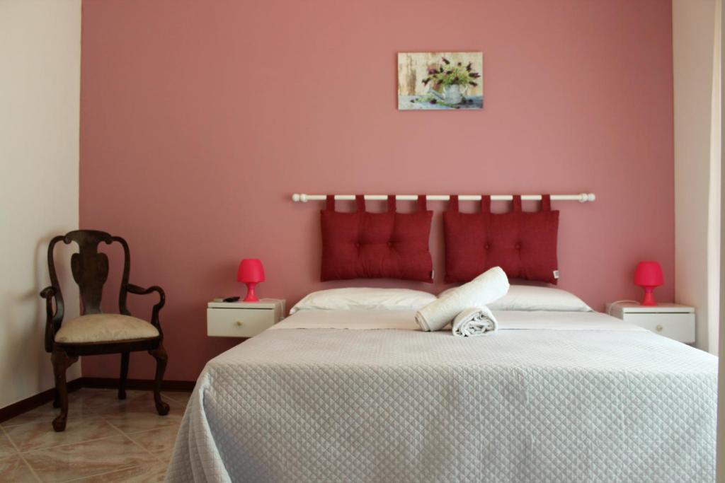 Posteľ alebo postele v izbe v ubytovaní Casa Chiarenza