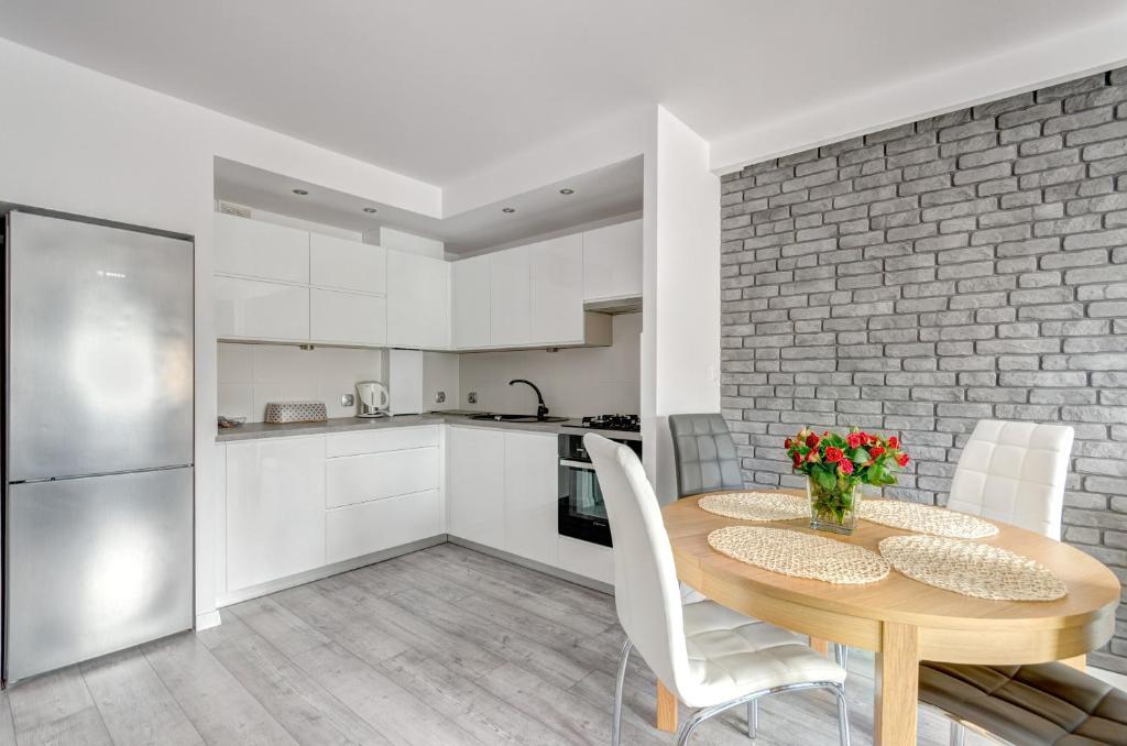 Kuchyňa alebo kuchynka v ubytovaní Prime Apartments - Skandynawski