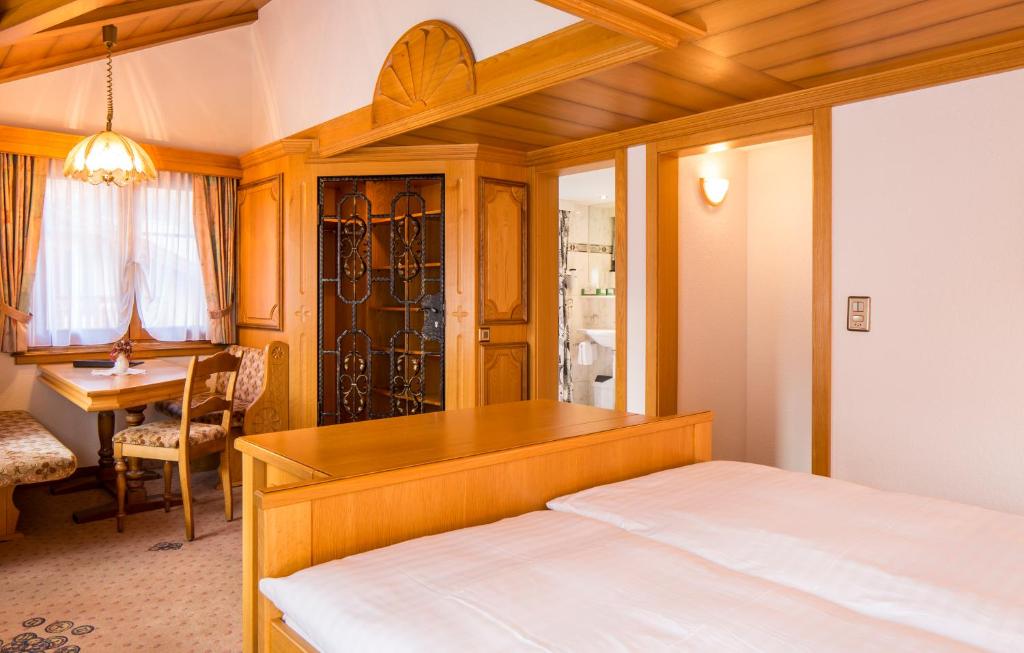 Postel nebo postele na pokoji v ubytování Hotel Olympia