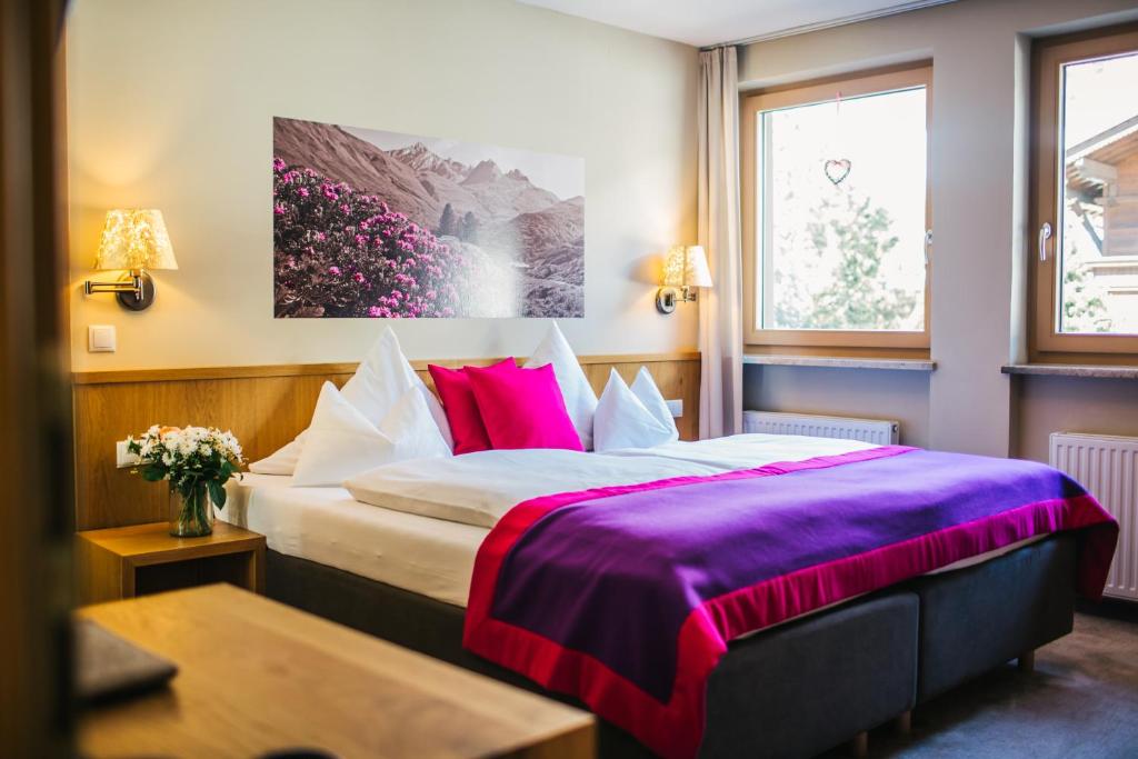 Postel nebo postele na pokoji v ubytování Hotel Dr Otto Murr B&B