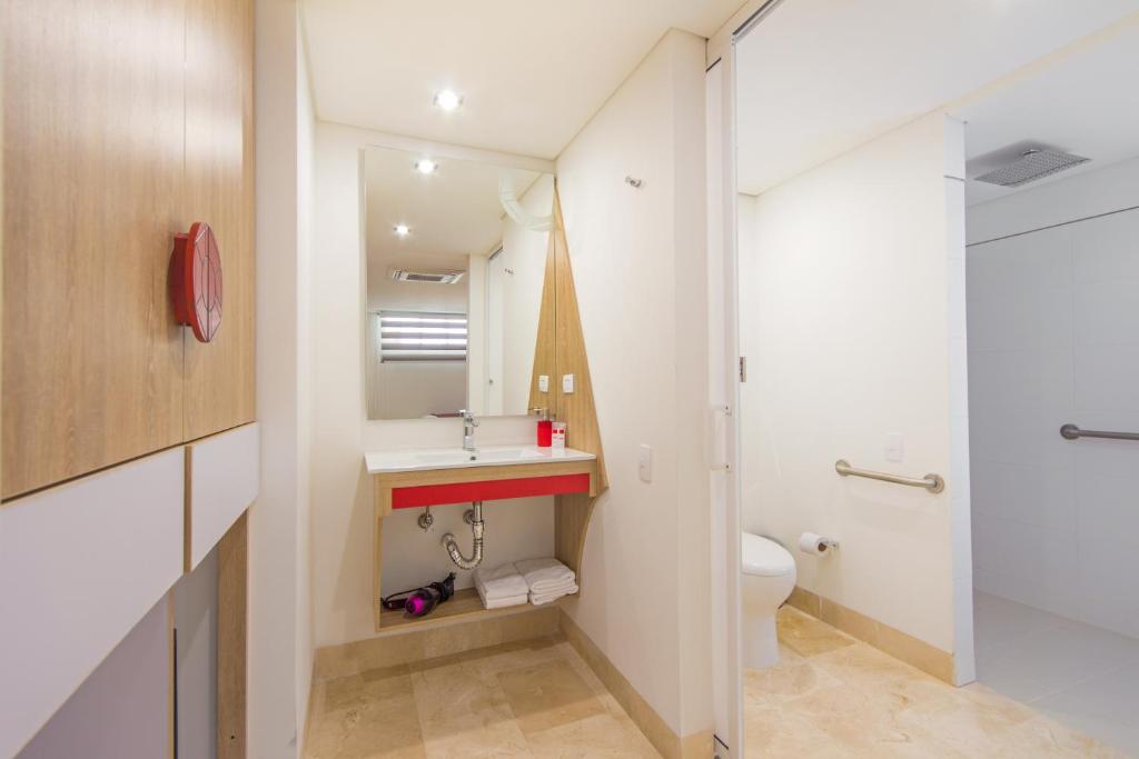 Koupelna v ubytování Obo Hotel