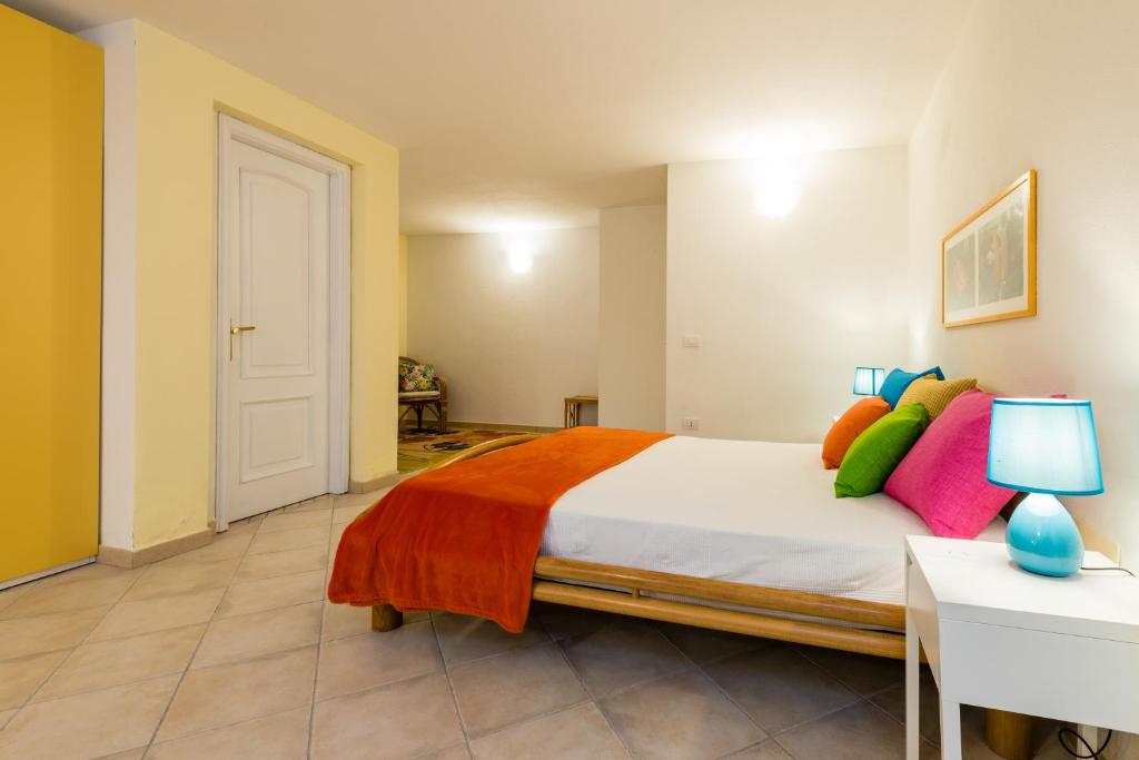 A bed or beds in a room at Apartment in S'Abba e Sa Pedra with pool