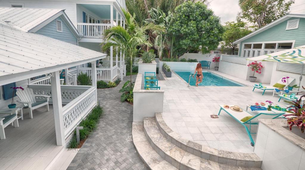 an aerial view of a house with a swimming pool at The Gardens Hotel in Key West
