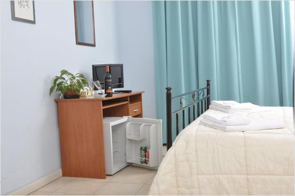 Łóżko lub łóżka w pokoju w obiekcie Gialel Guesthouse