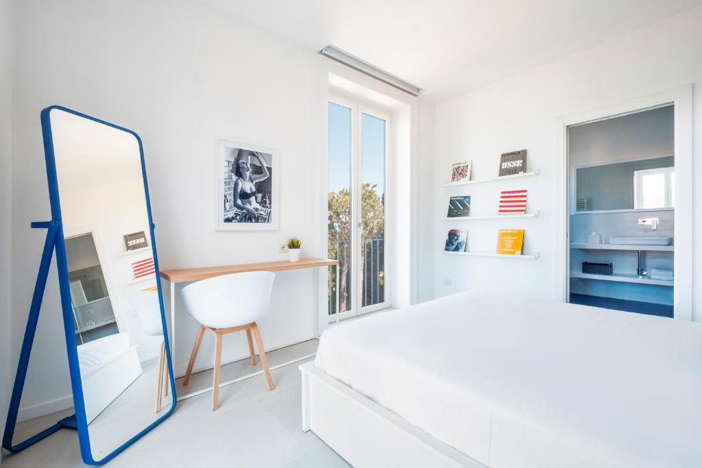 Postel nebo postele na pokoji v ubytování AE Home|Studio