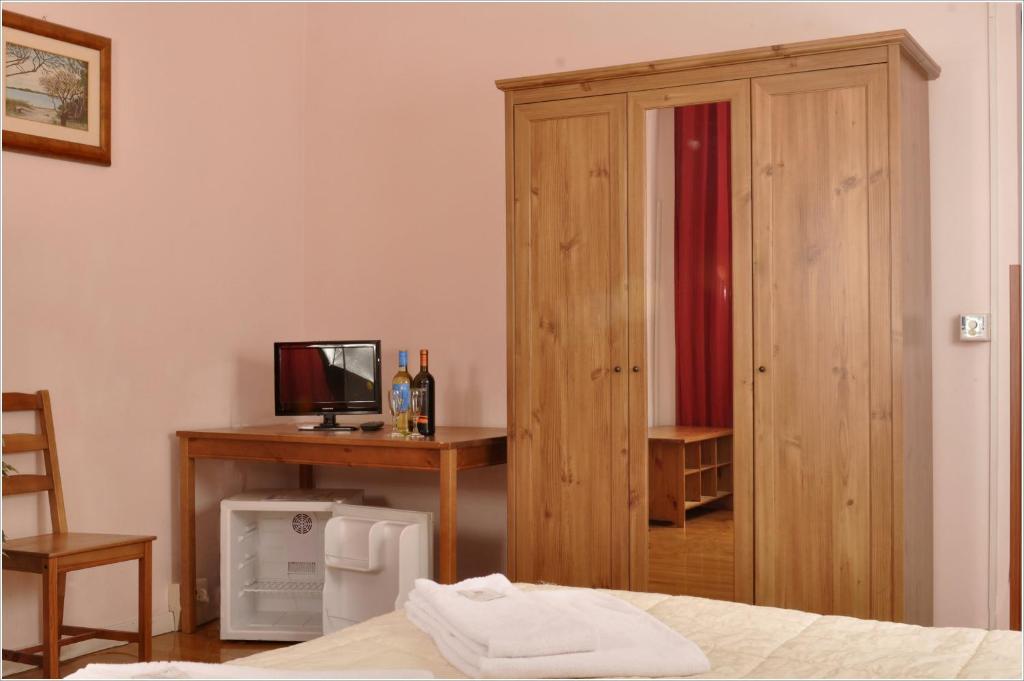 Łóżko lub łóżka w pokoju w obiekcie Gialel Guesthouse
