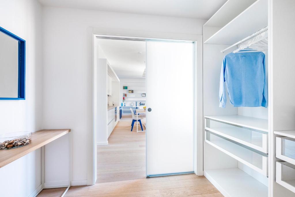 Postel nebo postele na pokoji v ubytování AE Home|Studio
